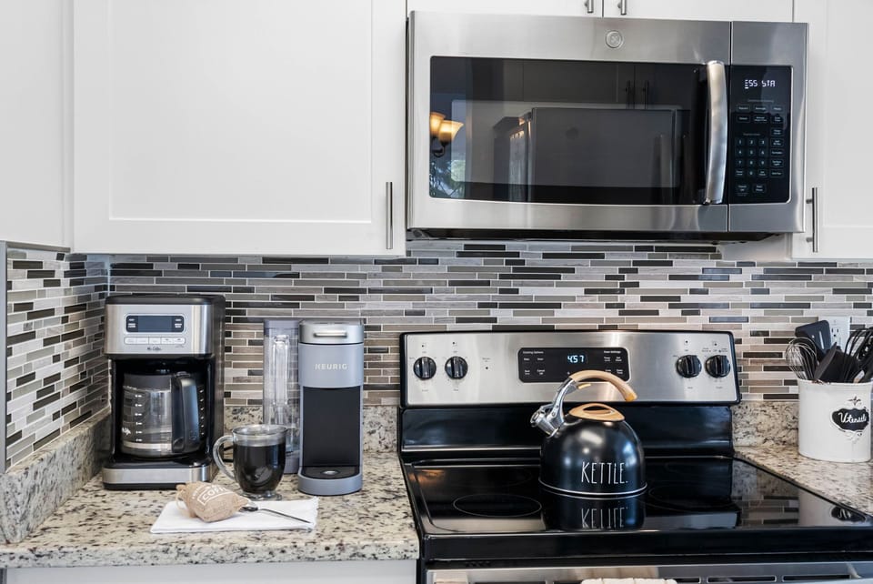 From morning coffee to full dinners, this kitchen has everything you need, including a microwave, toaster, and coffee maker.