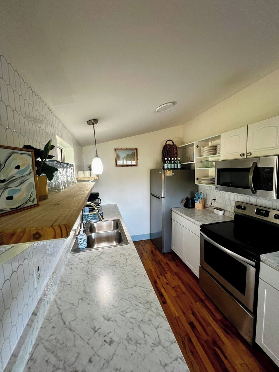 Fully stocked kitchen. Labeled cabinets and drawers for easily finding things.