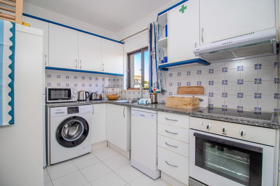 Fitted kitchen equipped with appliances