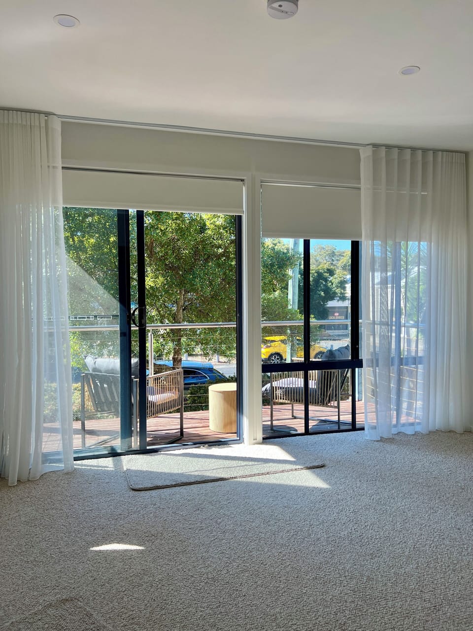 upstairs living room with balcony, district outlook