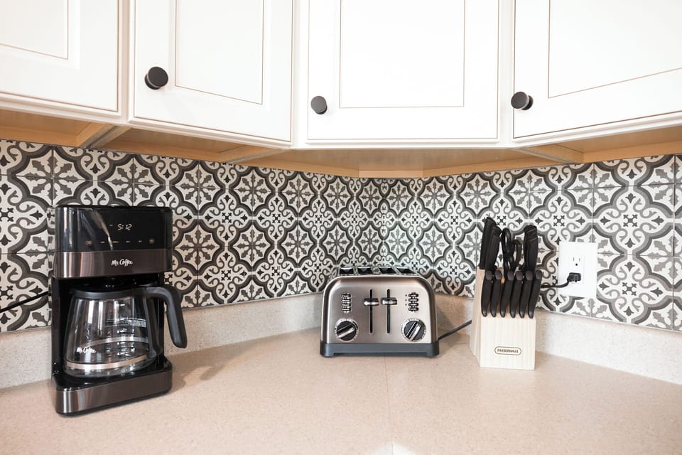 Kitchen nook; also Keurig machine is included and sugar/coffee (regular + decaf)