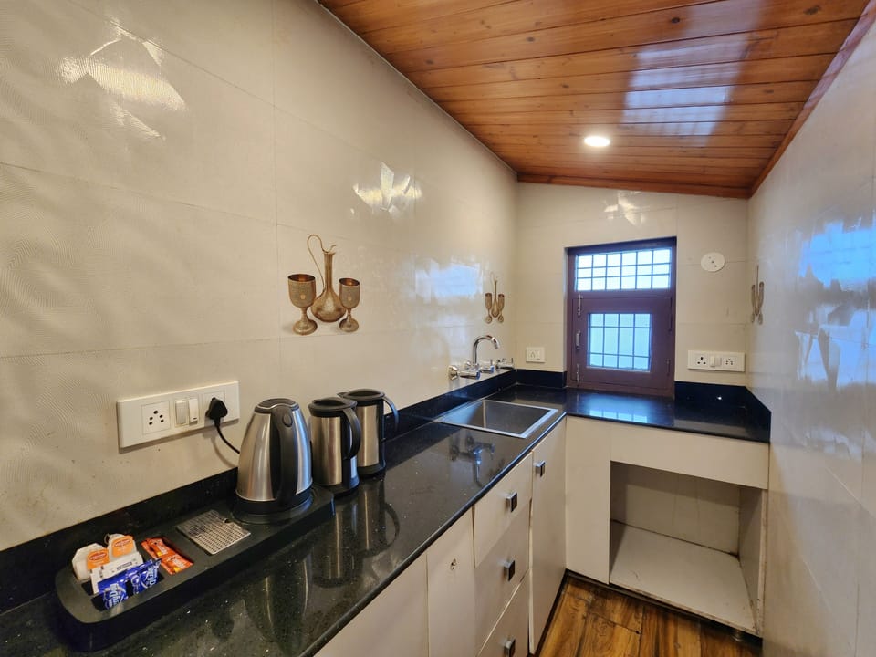 Family Room, Balcony, Mountain View | Private kitchen