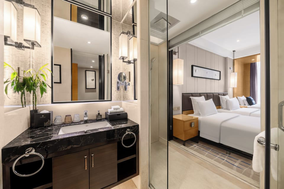 Family Triple Room, Multiple Beds | In-room safe, desk, laptop workspace, blackout drapes
