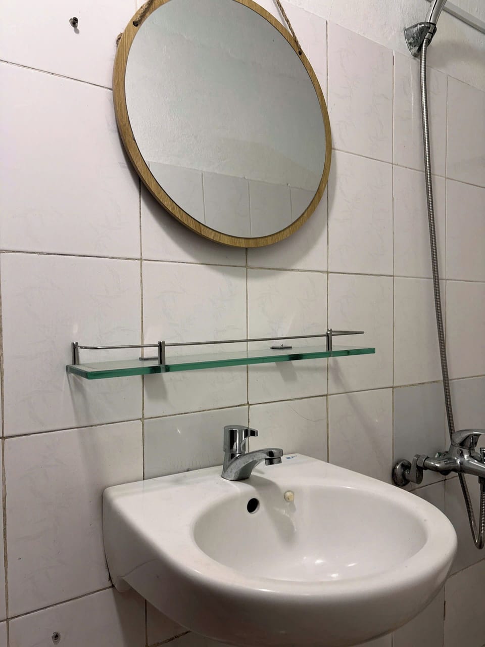 Shower, hair dryer, slippers, towels