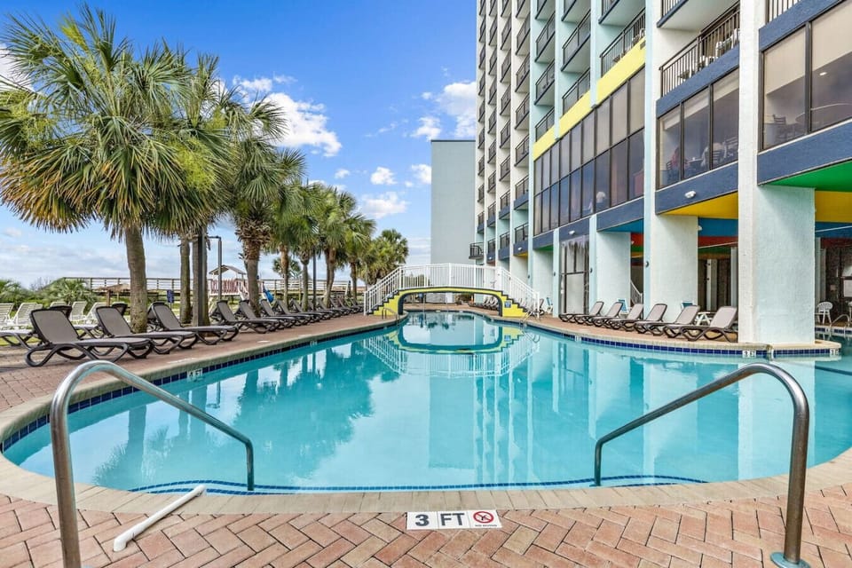 Gorgeous oceanfront outdoor pool is steps away from the beach.  The perfect family experience.