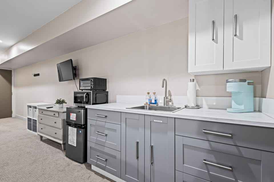 Functional kitchenette corner ready for your morning coffee or evening bite.