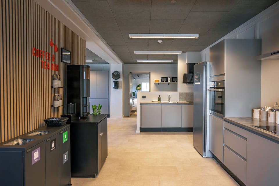 Shared fridge, microwave, cleaning supplies, paper towels