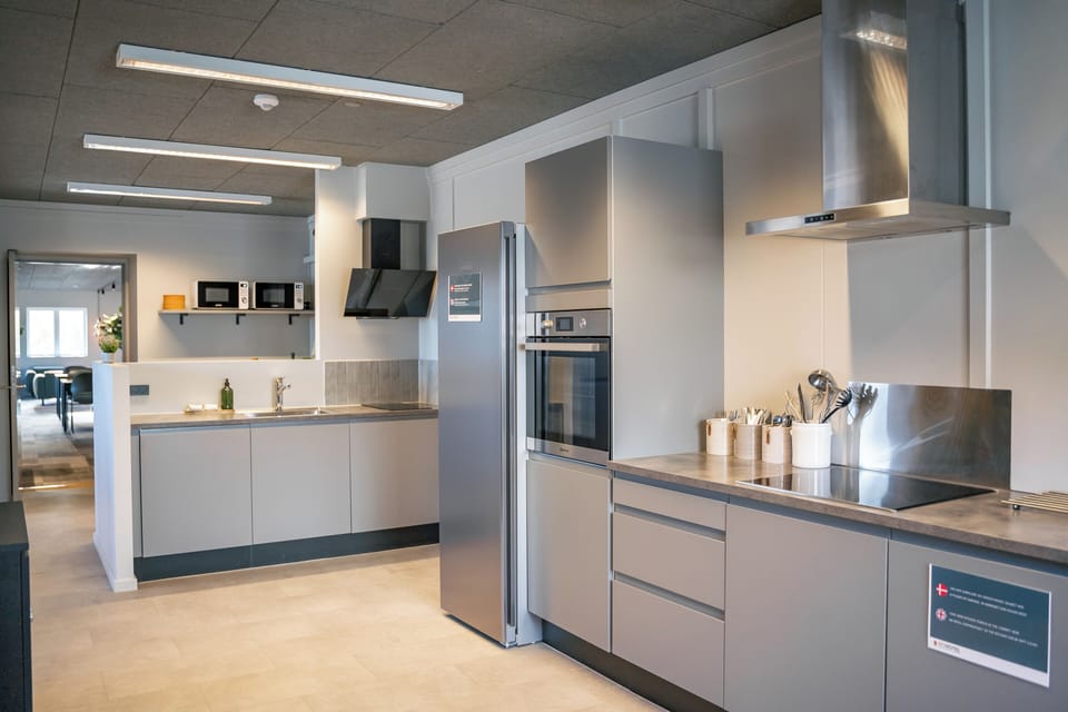 Shared fridge, microwave, cleaning supplies, paper towels