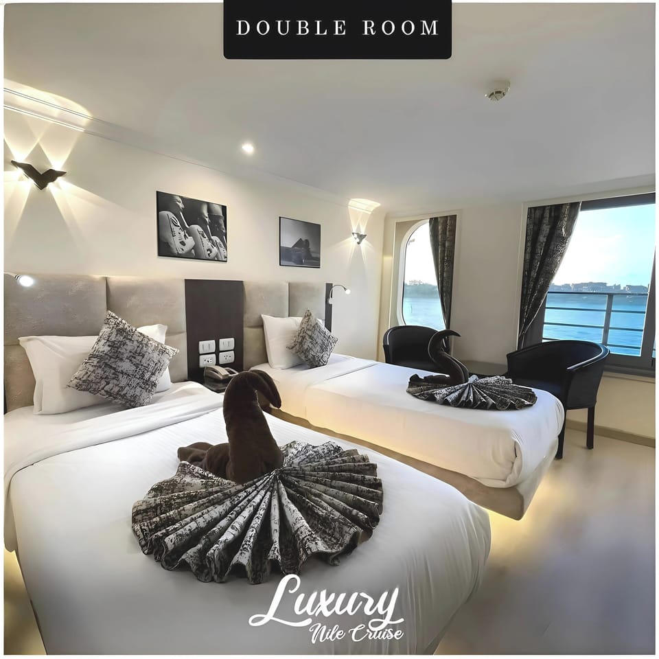 Deluxe Double Room, River View | In-room safe, blackout drapes, soundproofing