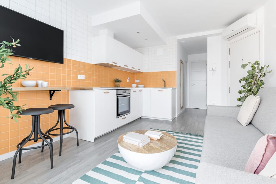 Classic Apartment | Living area | 50-cm TV with cable channels