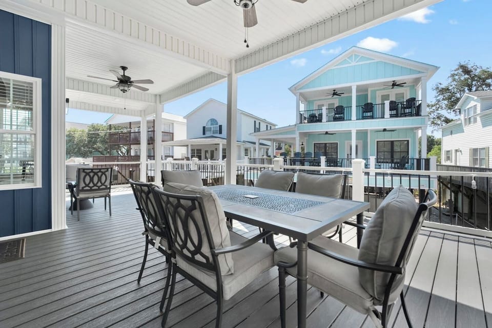 Gather around the coastal dining table for laughter and fresh seafood dinners.