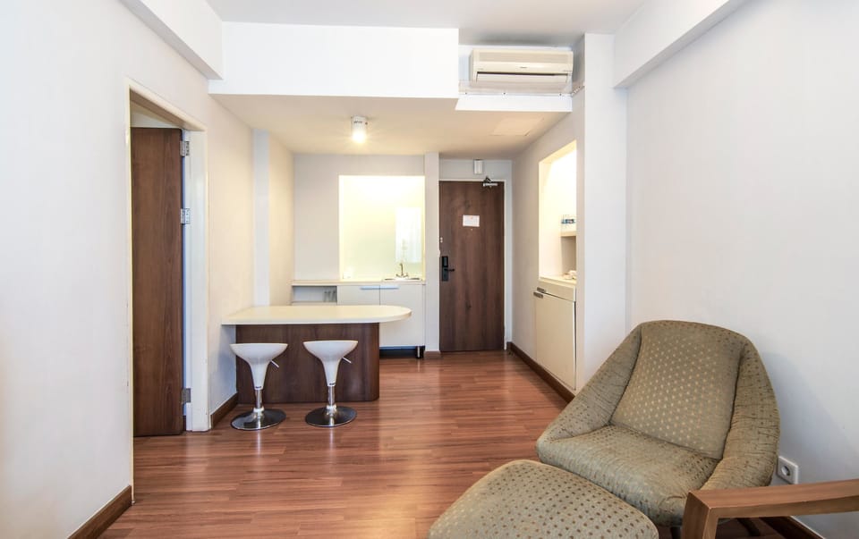 Junior Suite | Living room | Flat-screen TV