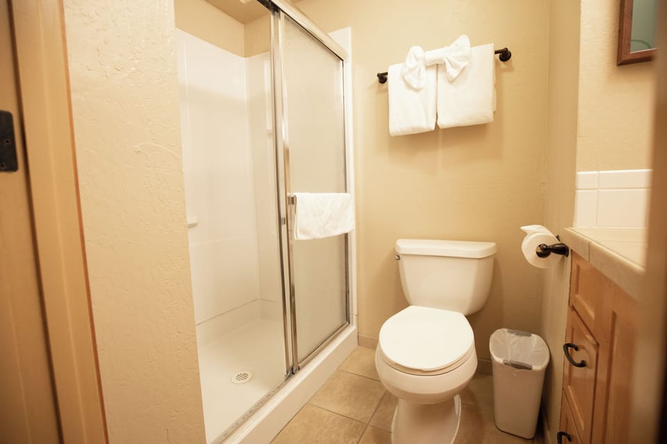 Two Bedroom | Bathroom | Combined shower/tub, hair dryer, towels