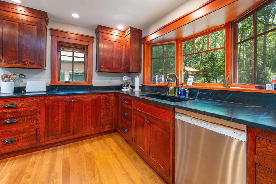 Kitchen with lots of natural light., brand new dishwasher.