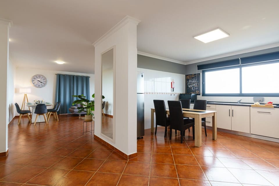 Enjoy seamless flow from kitchen to dining, ideal for relaxed meals and easy living during your stay.