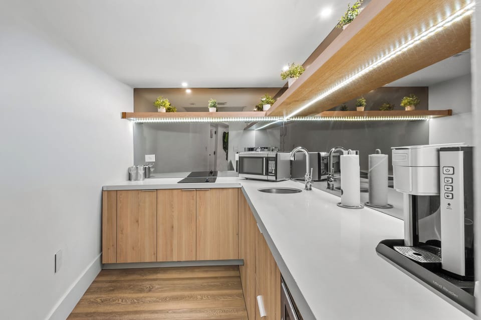 Two Bedroom with Balcony | Private kitchen | Fridge, microwave, coffee/tea maker, dining tables