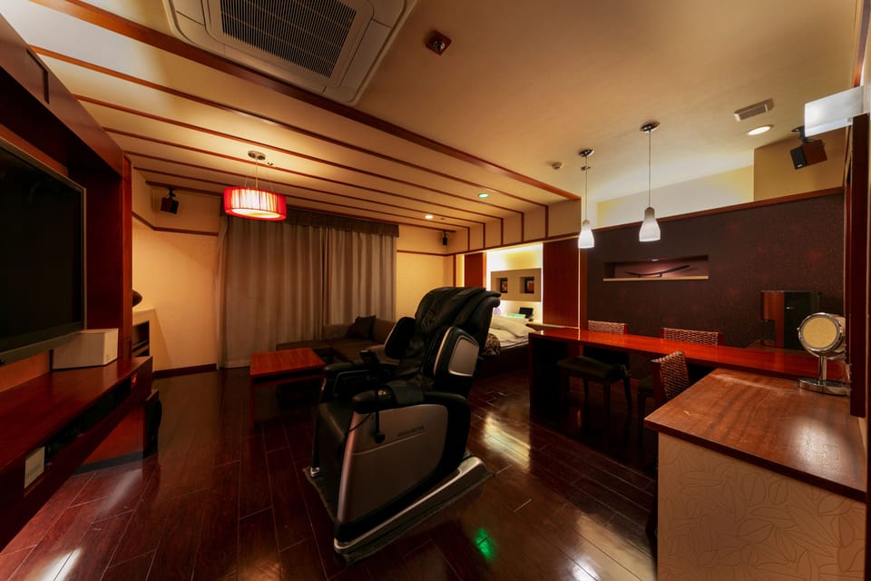 Superior Double Room | Living area | 65-inch LCD TV with premium channels, TV, video-game console