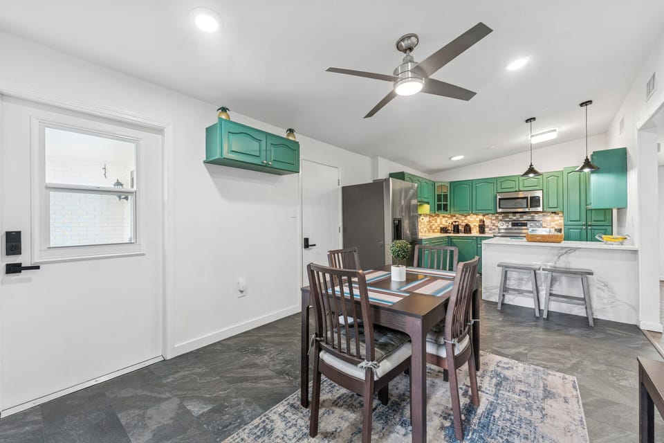 Fully equipped kitchen with breakfast nook plus dining area.