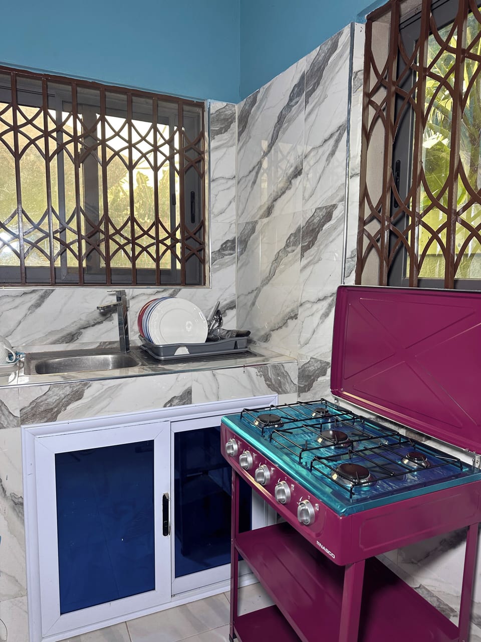 Mini-fridge, microwave, stovetop, cookware/dishes/utensils