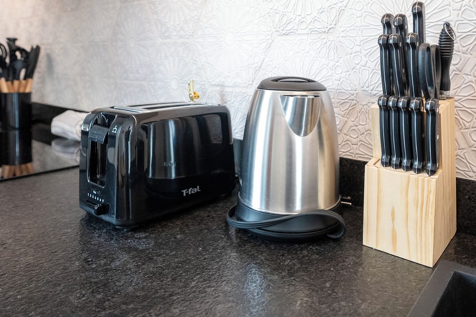 Deluxe Apartment, 2 Bedrooms, Terrace | Private kitchen | Fridge, espresso maker, coffee/tea maker, electric kettle