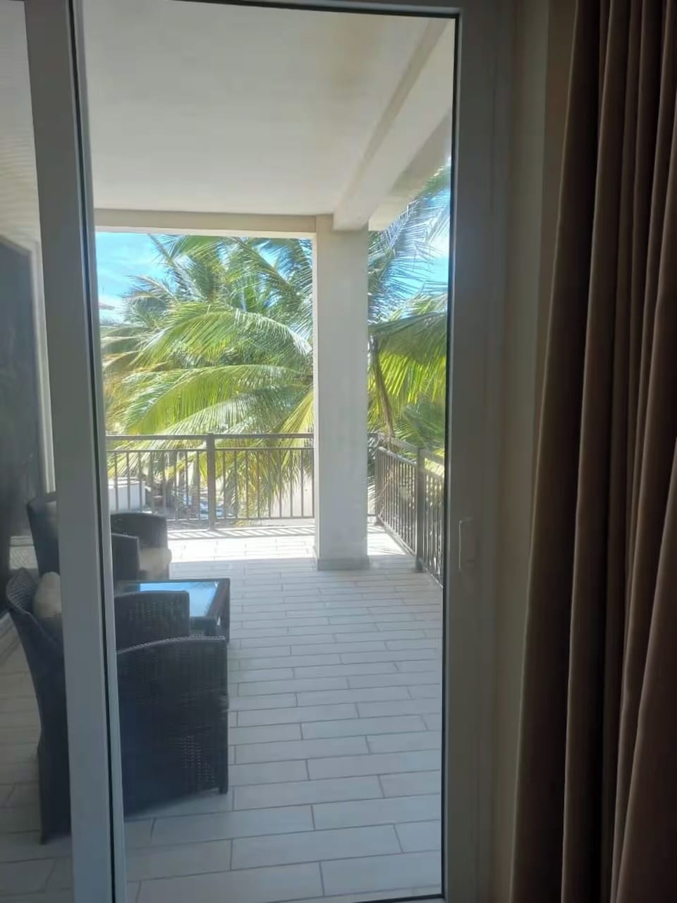 Terrace with beach and pool views