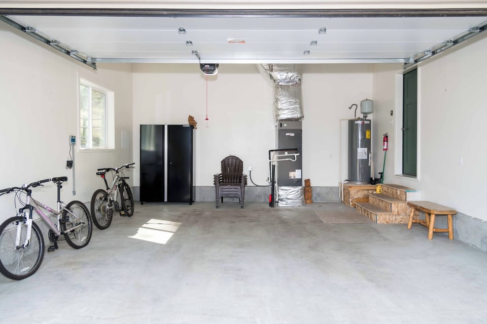 Spacious garage with complimentary bikes and snowshoes for guest adventures