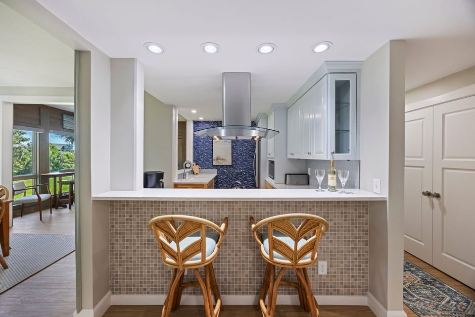 Kitchen with two bar stools