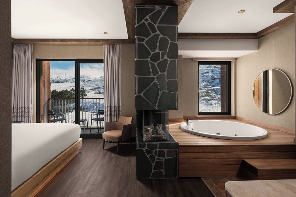 Suite, 1 King Bed, Non Smoking, Mountain View (Balcony) | Premium bedding, minibar, in-room safe, desk