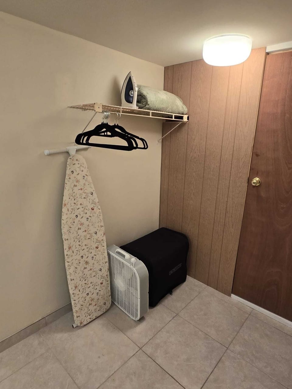 Walk-in closet and luggage storage.