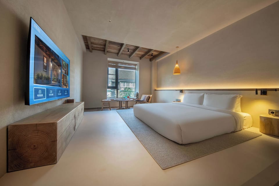 Senior Double Room, Courtyard View | Down comforters, minibar, laptop workspace, blackout drapes