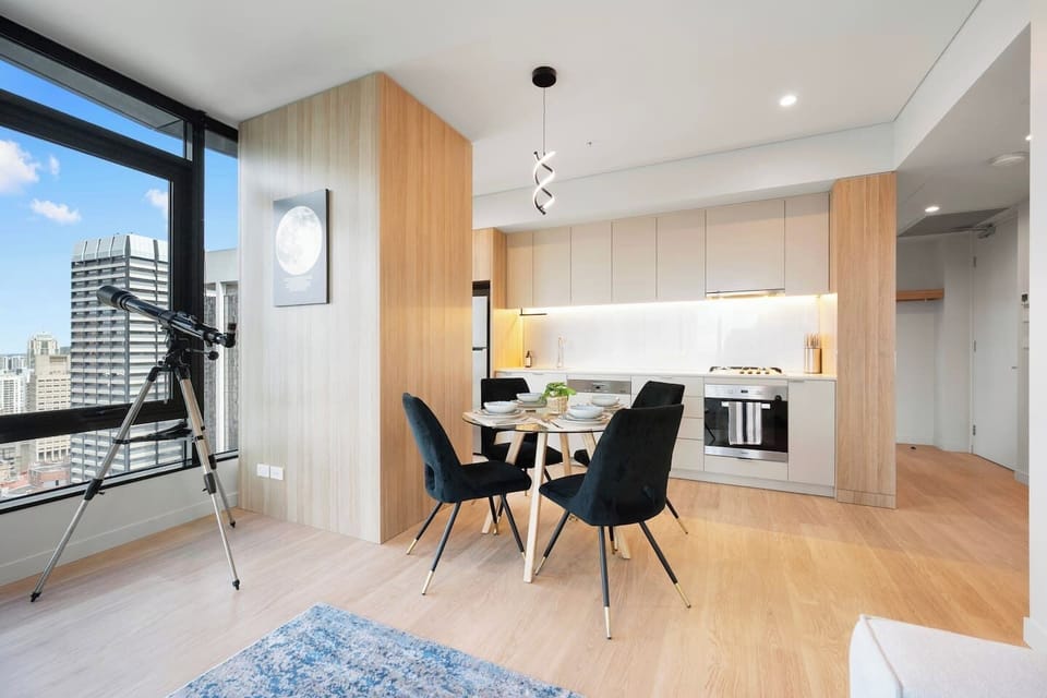 Enjoy meals with skyline views at the elegant dining table