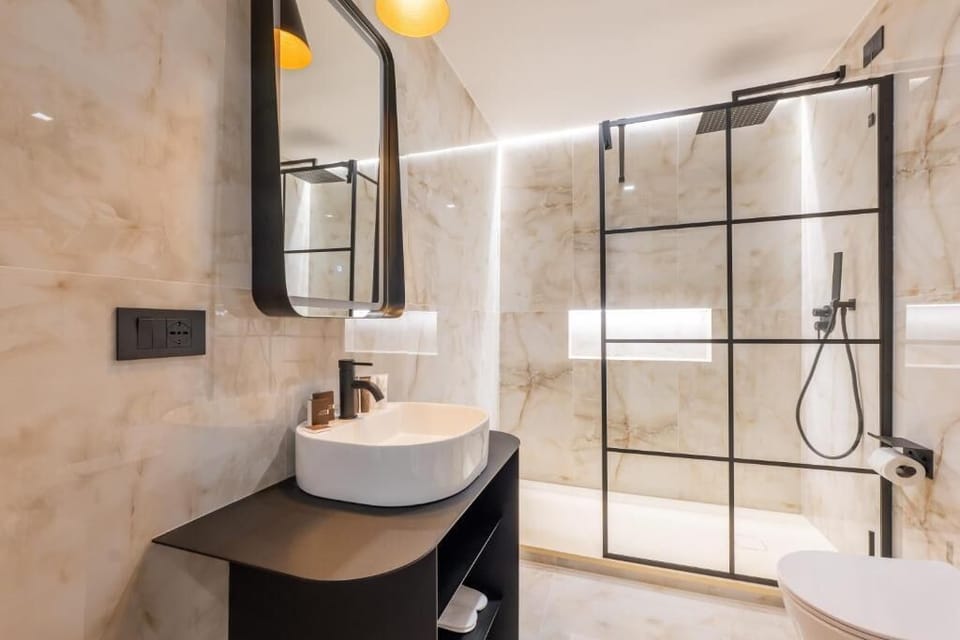 Shower, free toiletries, hair dryer, slippers