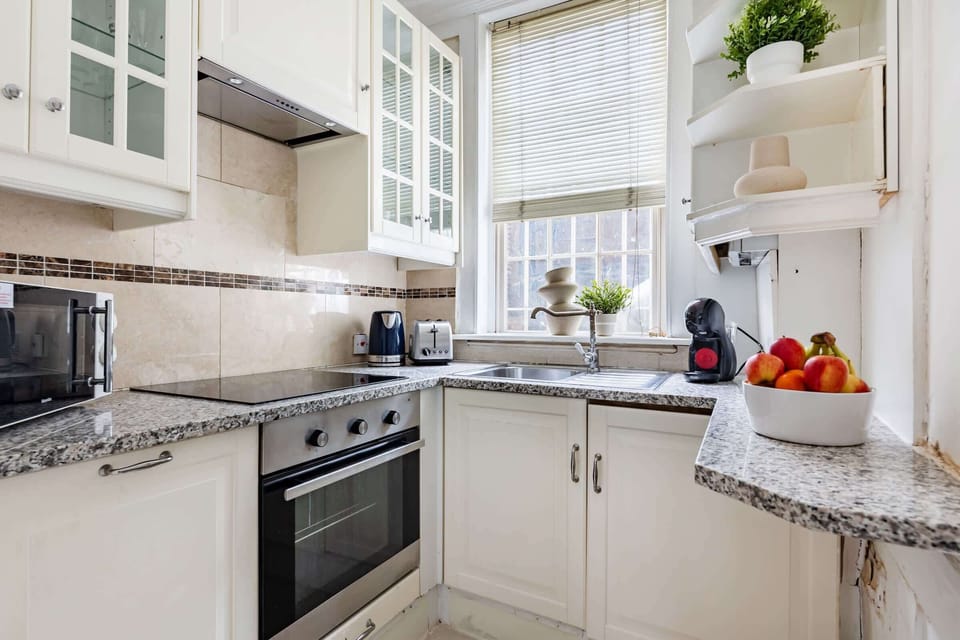The kitchen is fully equipped to prepare a simple meal 