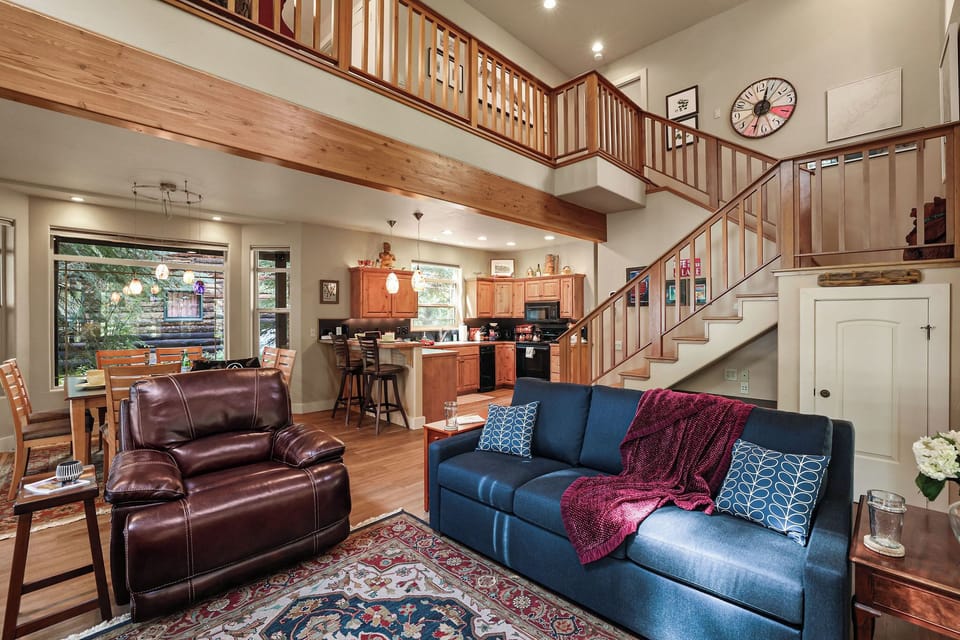 The home features an open concept main floor perfect for entertaining, as well as an upstairs loft for an additional space to relax and recharge