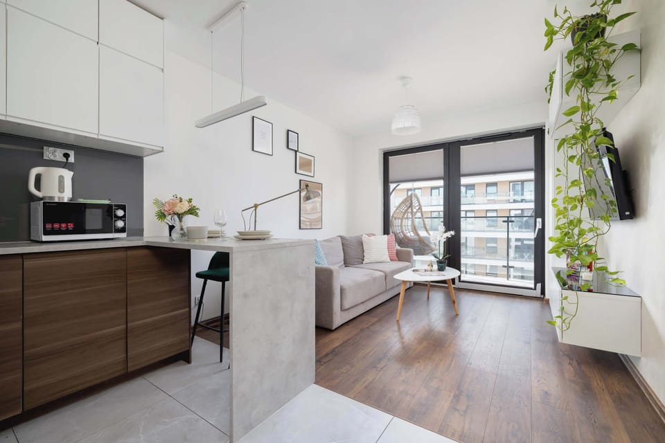 The living room's beautiful design complemented by natural light streaming in.
