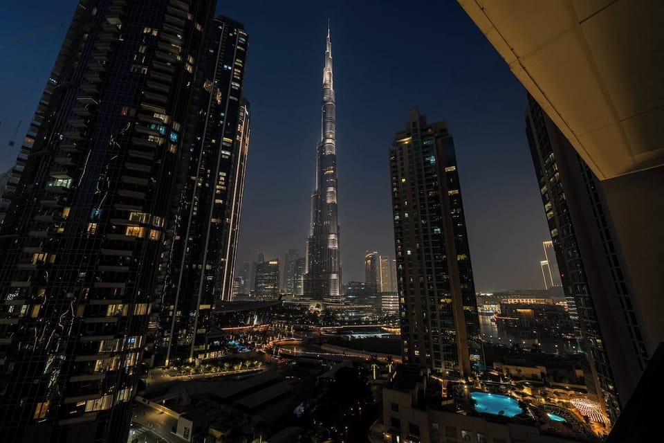 The iconic Burj Khalifa lights up in a dazzling display, glowing with patterns!