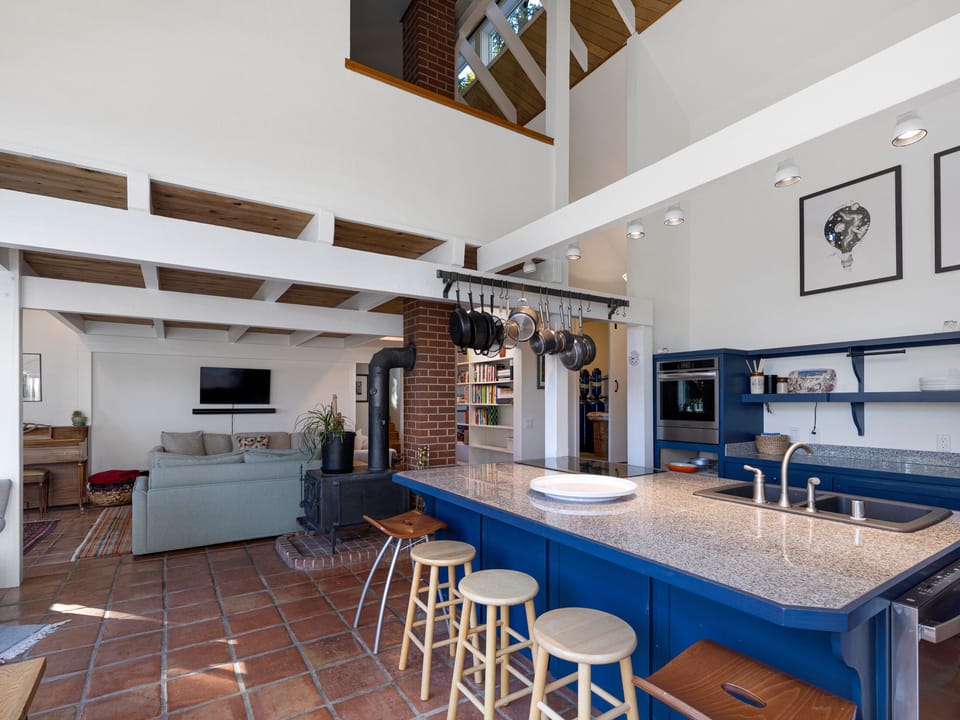 Spacious open floor plan with loft shown above