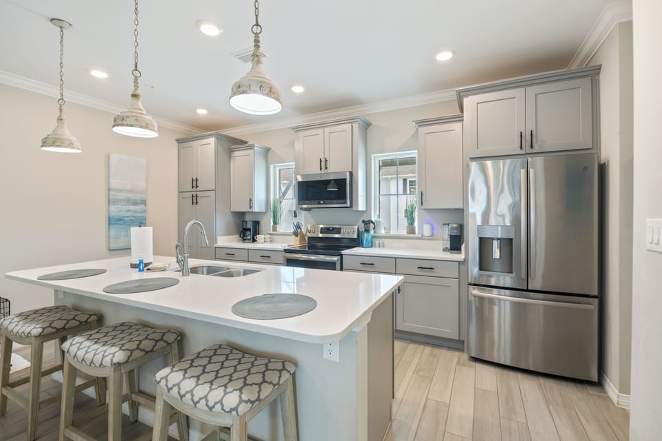 Beautiful Moments - 14237 Beach Heather Drive at Lost Key - Beautiful modern kitchen and island.