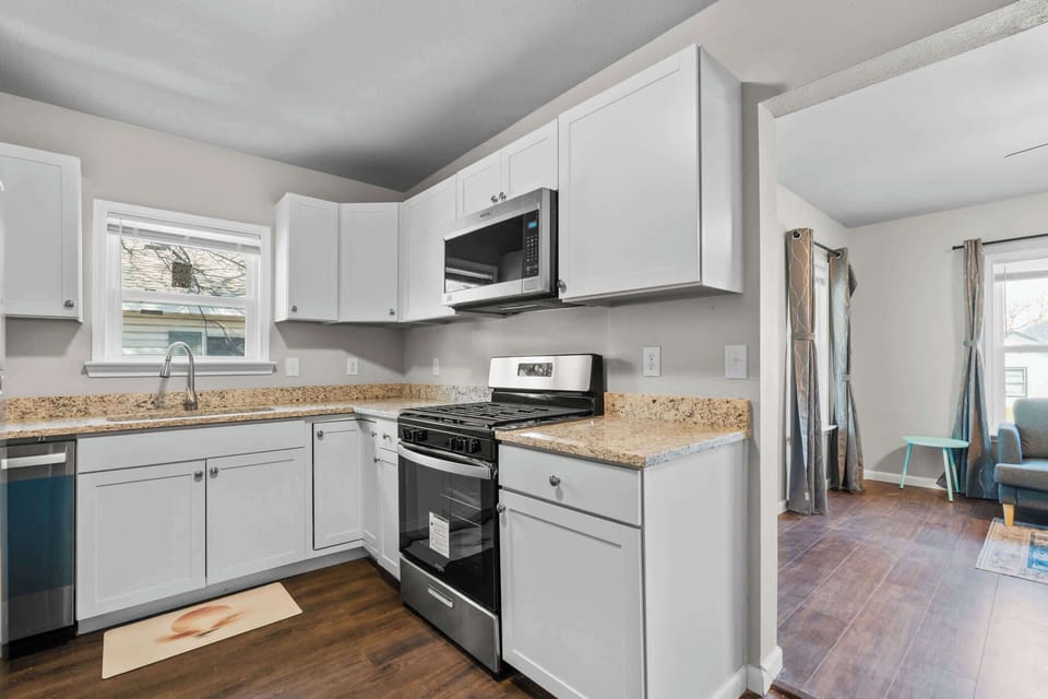 
This kitchen is every chef’s dream, featuring high-end appliances, sleek countertops, and custom cabinetry.