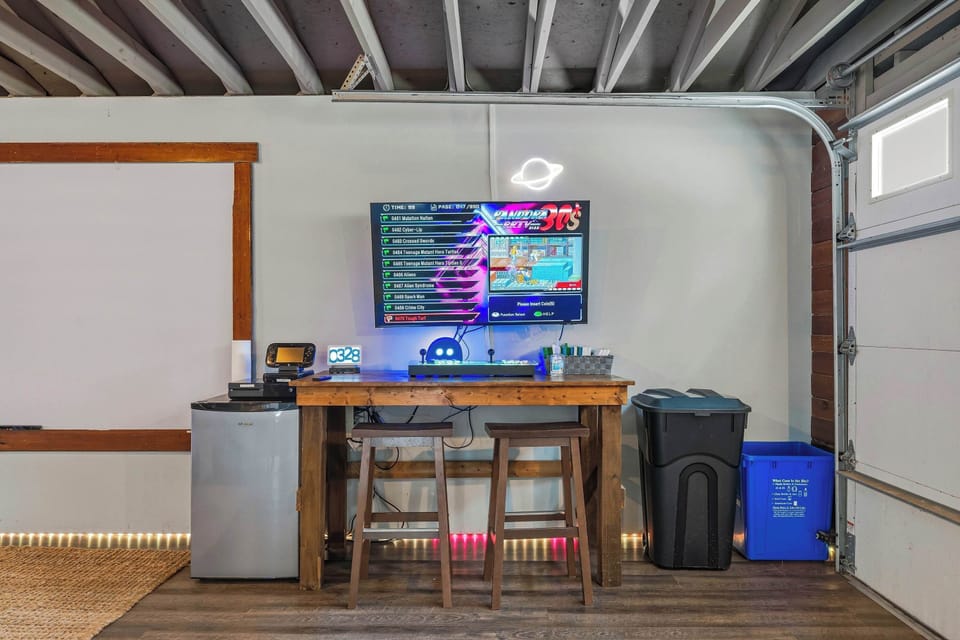 Take a trip back in time with the retro arcade table featuring hundreds of classic games — perfect for friendly competition and nostalgic late-night fun.