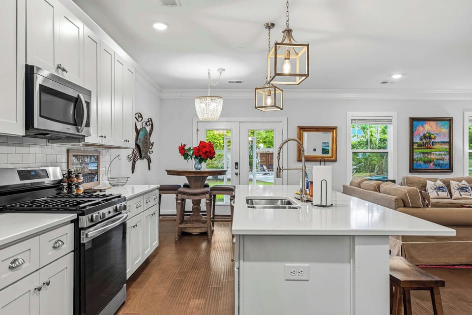 The open-concept layout creates a bright, spacious feel that keeps everyone connected whether you’re cooking, dining, or relaxing together.