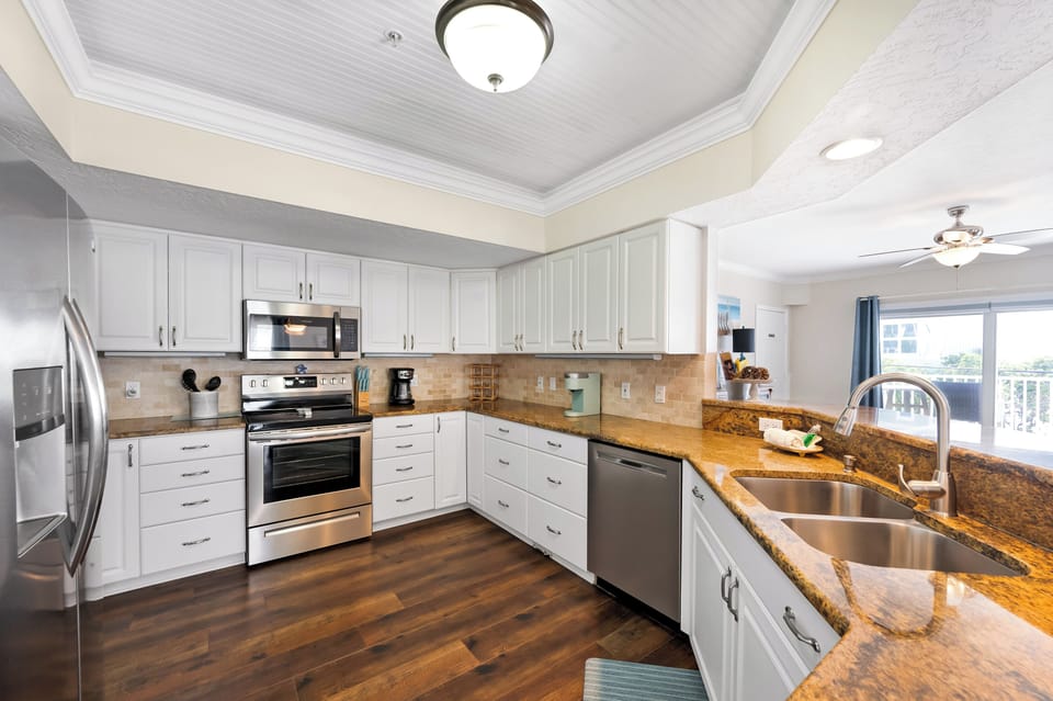 Fully equipped kitchen with stainless appliances
