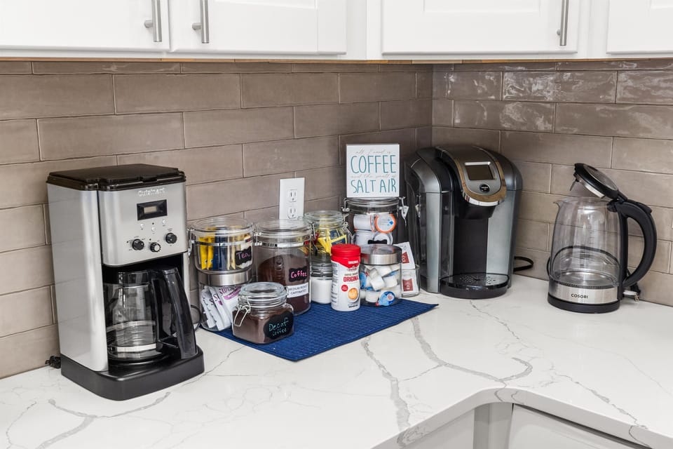 Guest-favorite coffee bar with coffee, teas, and hot cocoa for sunrise sips.
