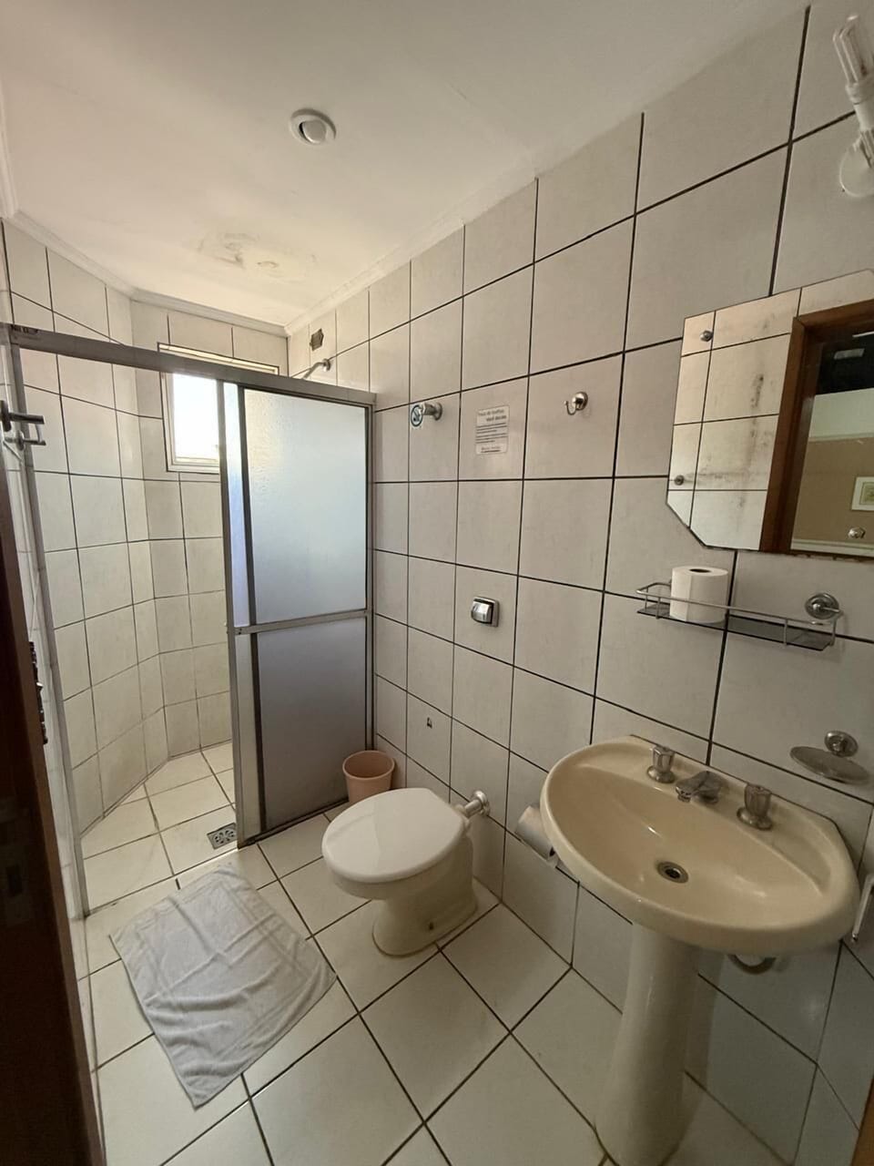 Shower, towels, soap, toilet paper