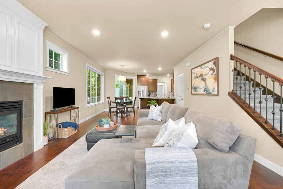 This stylish open layout blends relaxation and functionality, from the lounge space to the dining area and beyond.