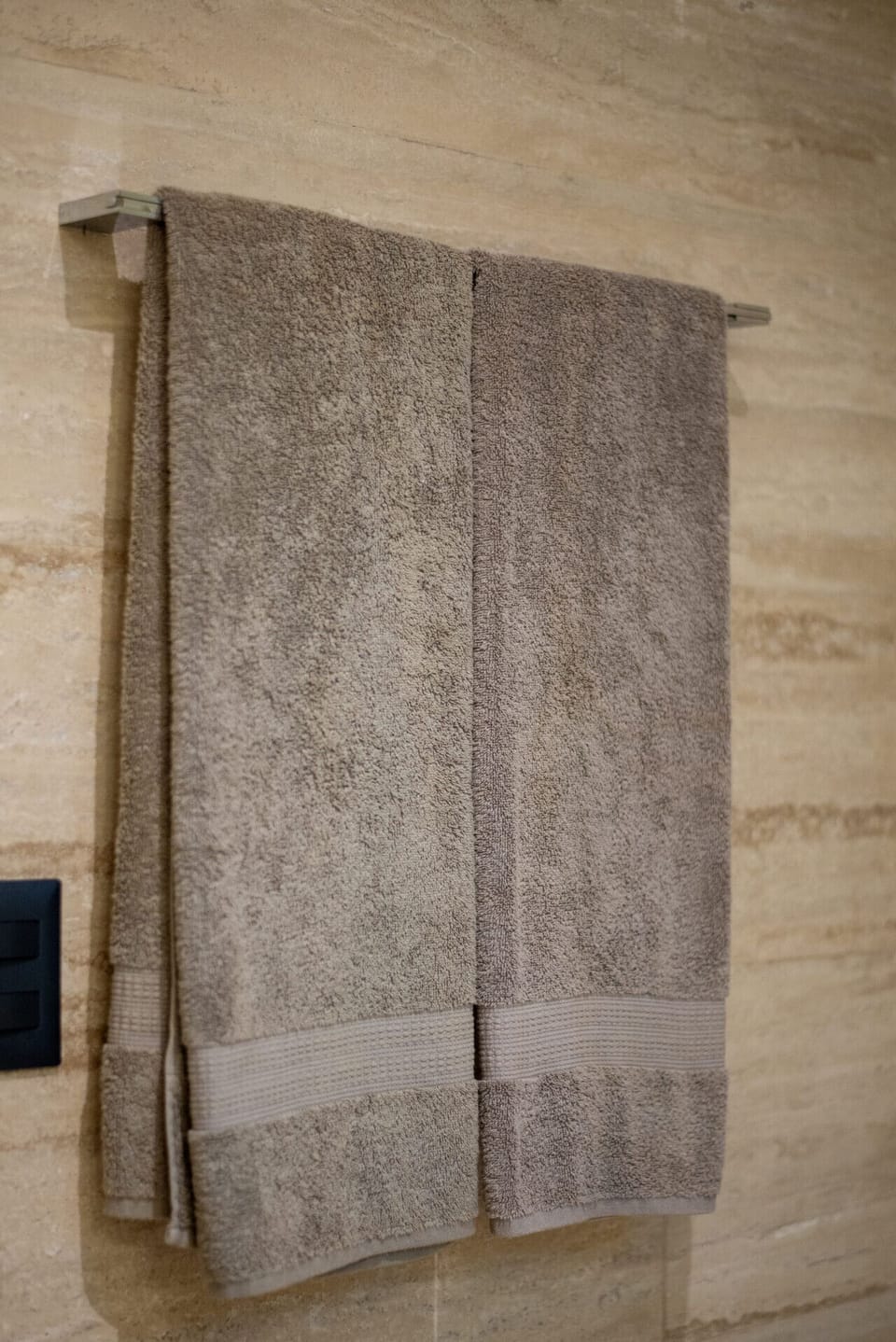 Fresh bath and beach towels for comfort anytime.