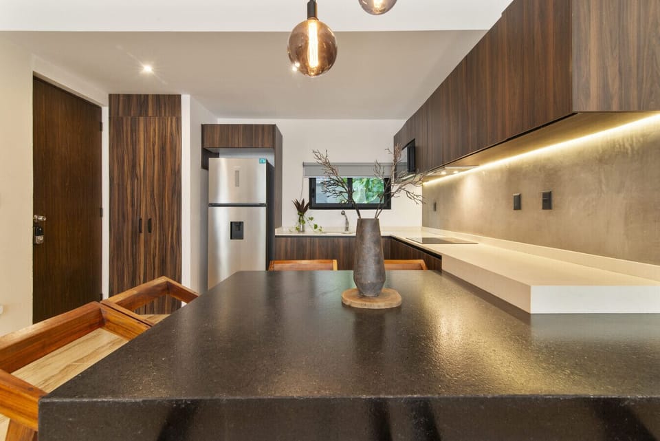 Stylish dining area with wood finishes and natural light.
