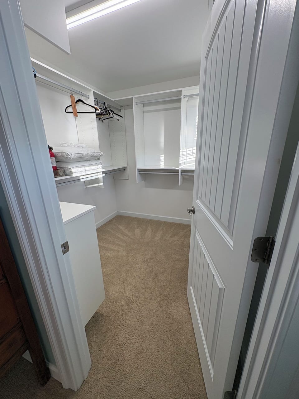 Primary closet has plenty of room to unpack!