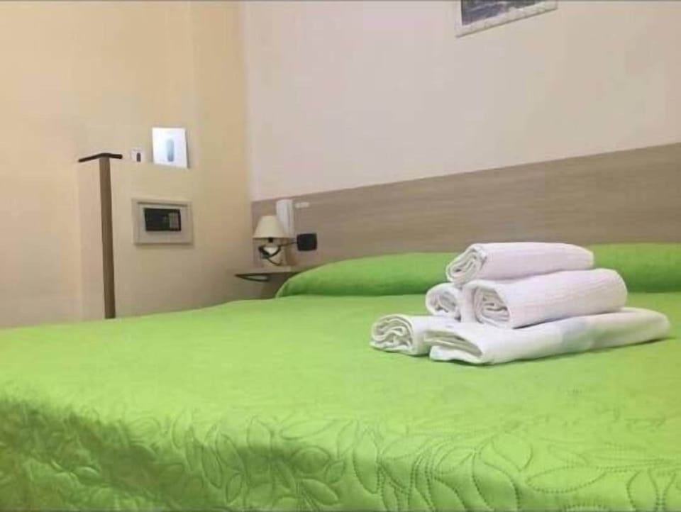 Triple Room, Partial Sea View | Desk, blackout drapes, free WiFi