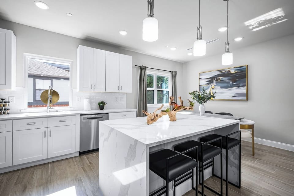 This kitchen island is a statement itself: minimalistic yet functional. Whip out dishes while your loved ones watch you in this kitchen island!